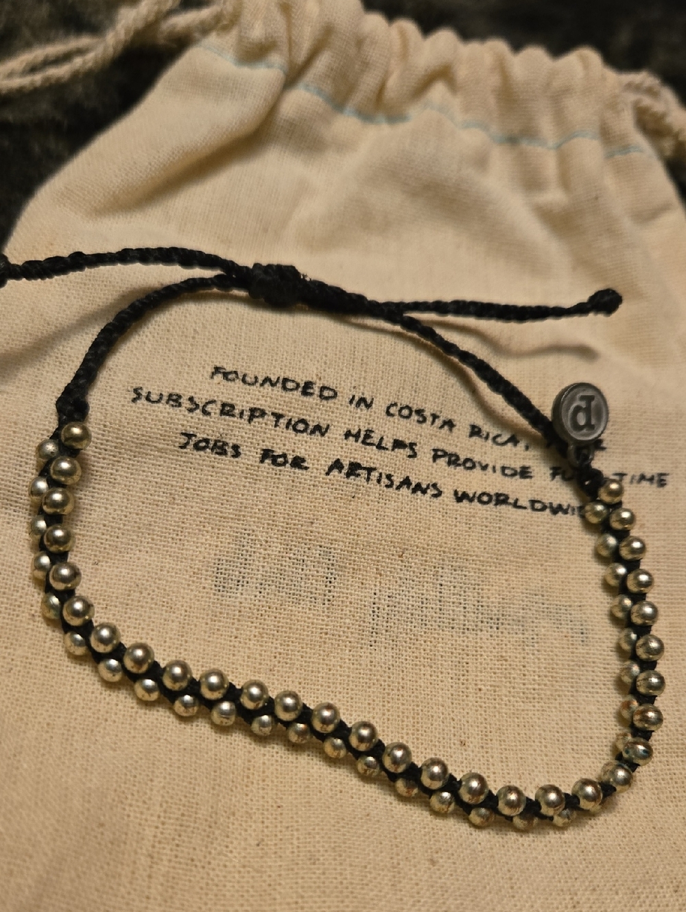 Adjustable Silver Beaded Bracelet with Black Cord